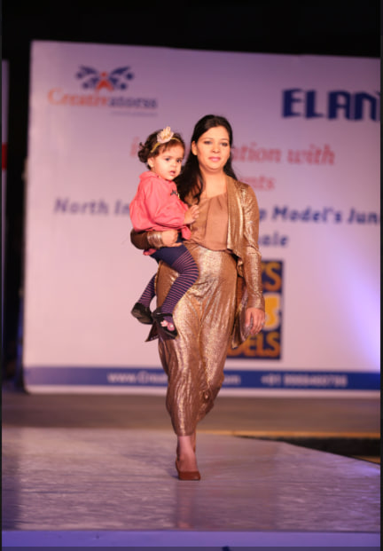 Mother and baby on runway