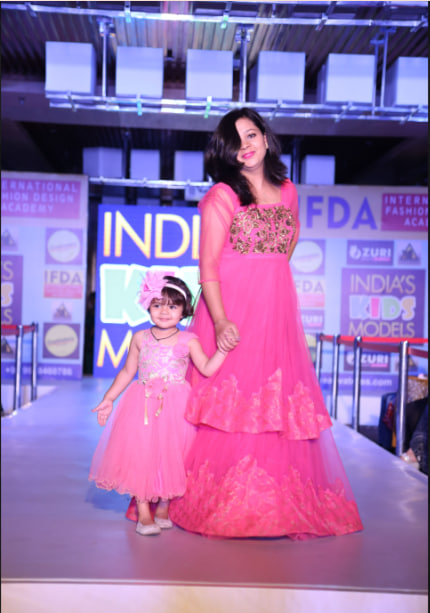 Pink dress mother and daughter