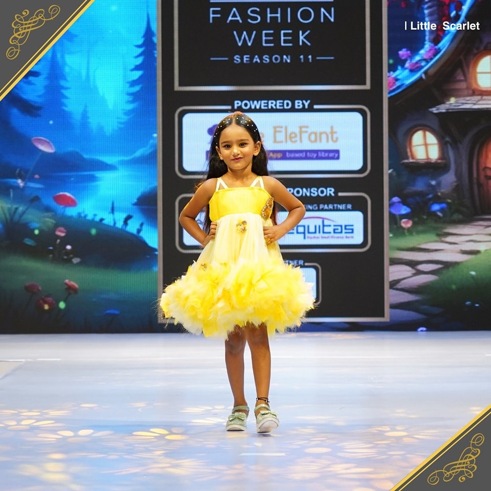 Little Scarlet on fashion runway